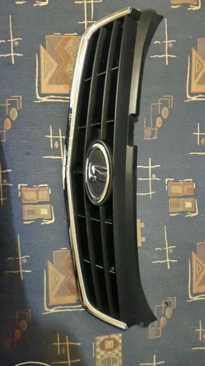 Лот: 4863004. Фото: 1. Решетка бампера Приора SE. Кузов