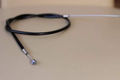 Лот: 7769032. Фото: 1. Тросик тормозной с рубашкой (Передний... Запчасти