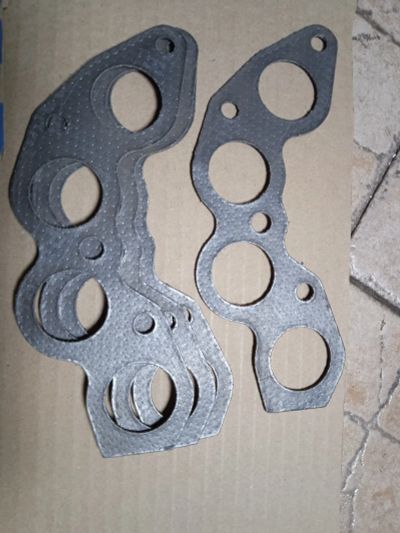 Лот: 25888750. Фото: 1. Прокладки выпускного коллектора... Двигатель и элементы двигателя