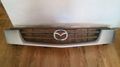 Лот: 7760132. Фото: 1. решетка радиатора mazda demio. Кузов