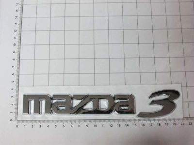 Лот: 10038502. Фото: 1. Эмблема шильдик Mazda 3 на багажник... Детали тюнинга