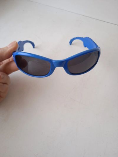 Лот: 17438216. Фото: 1. Детские солнечные очки в синей... Детские карнавальные, праздничные костюмы