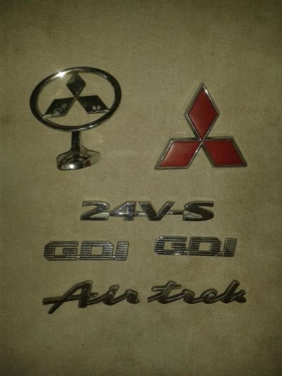 Лот: 10612478. Фото: 1. Шильдики на mitsubishi. Наклейки автомобильные