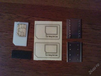 Лот: 769556. Фото: 1. остатки от адаптера на 2 сим карты... Другое (запчасти, оборудование)