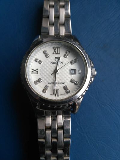 Лот: 19333635. Фото: 1. Часы кварцевые. Оригинальные наручные часы
