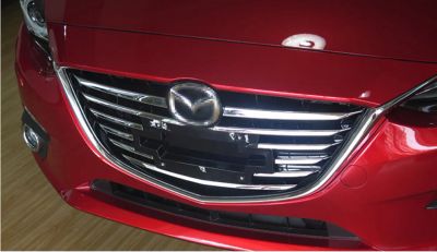 Лот: 10657294. Фото: 1. Накладки на переднею решетку Mazda... Детали тюнинга