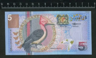 Лот: 25884853. Фото: 1. Суринам 5 гульденов пресс. Африка