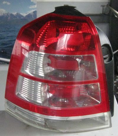 Лот: 20860236. Фото: 1. Задний левый фонарь Opel Zafira... Оптика и освещение