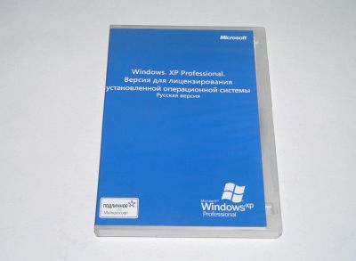 Лот: 9190438. Фото: 1. Лицензионный диск Windows XP SP2... Системные