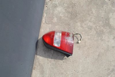 Лот: 5408903. Фото: 1. Mazda familia Фонарь задний с... Оптика и освещение