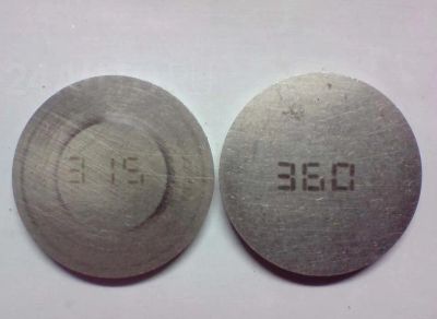 Лот: 7535100. Фото: 1. Шайбы регулировки зазоров клапанов... Двигатель и элементы двигателя