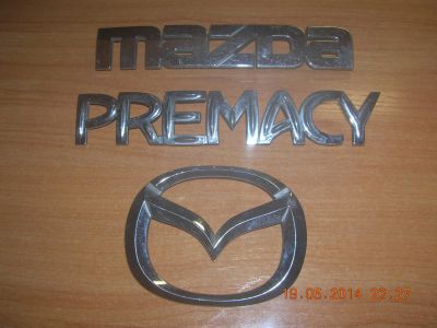 Лот: 4112360. Фото: 1. Шильдики на Mazda (д). Кузов