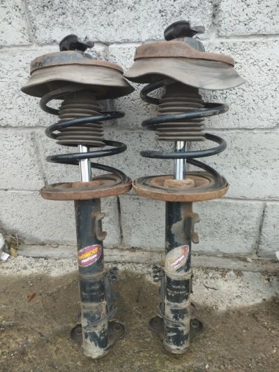 Лот: 25899954. Фото: 1. Стойки с пружинами в сборе передние... Ходовая, подвеска, рулевое управление