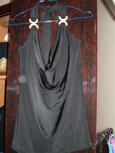 Лот: 1197693. Фото: 1. топ с эффектным вырезом. новое... Футболки, топы и майки