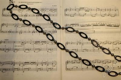 Лот: 212132. Фото: 1. Черные бусы с оваликами. Цепочки