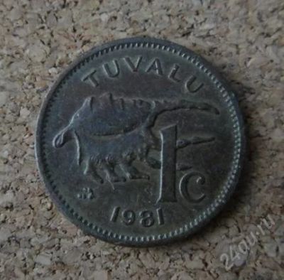 Лот: 1059837. Фото: 1. Морская ракушка на монете Тувалу... Австралия и Океания