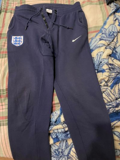 Лот: 20932133. Фото: 1. Брюки приталенного кроя Nike England. Штаны для тренировок