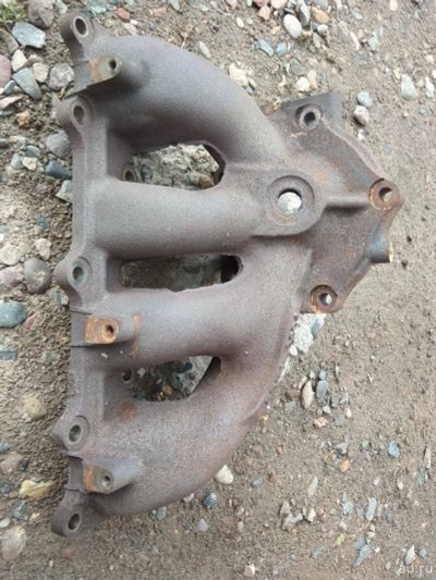 Лот: 13725355. Фото: 1. Коллектор выпускной. Двигатель и элементы двигателя