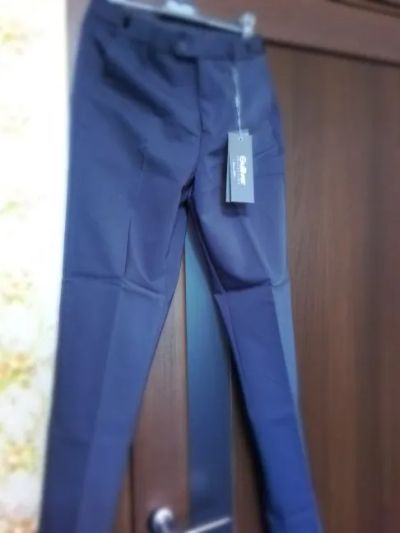 Лот: 19389354. Фото: 1. брюки новые серые, 170. Брюки, джинсы, шорты
