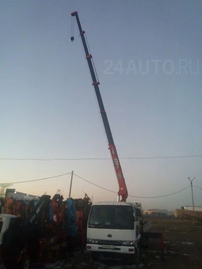 Лот: 6130061. Фото: 1. Nissan Diaesel бортовой 5тонн... Грузовики, автобусы, спецтехника