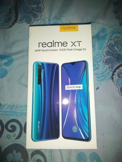 Лот: 16063423. Фото: 1. Смартфон Realme XT 8+128GB Blue... Смартфоны