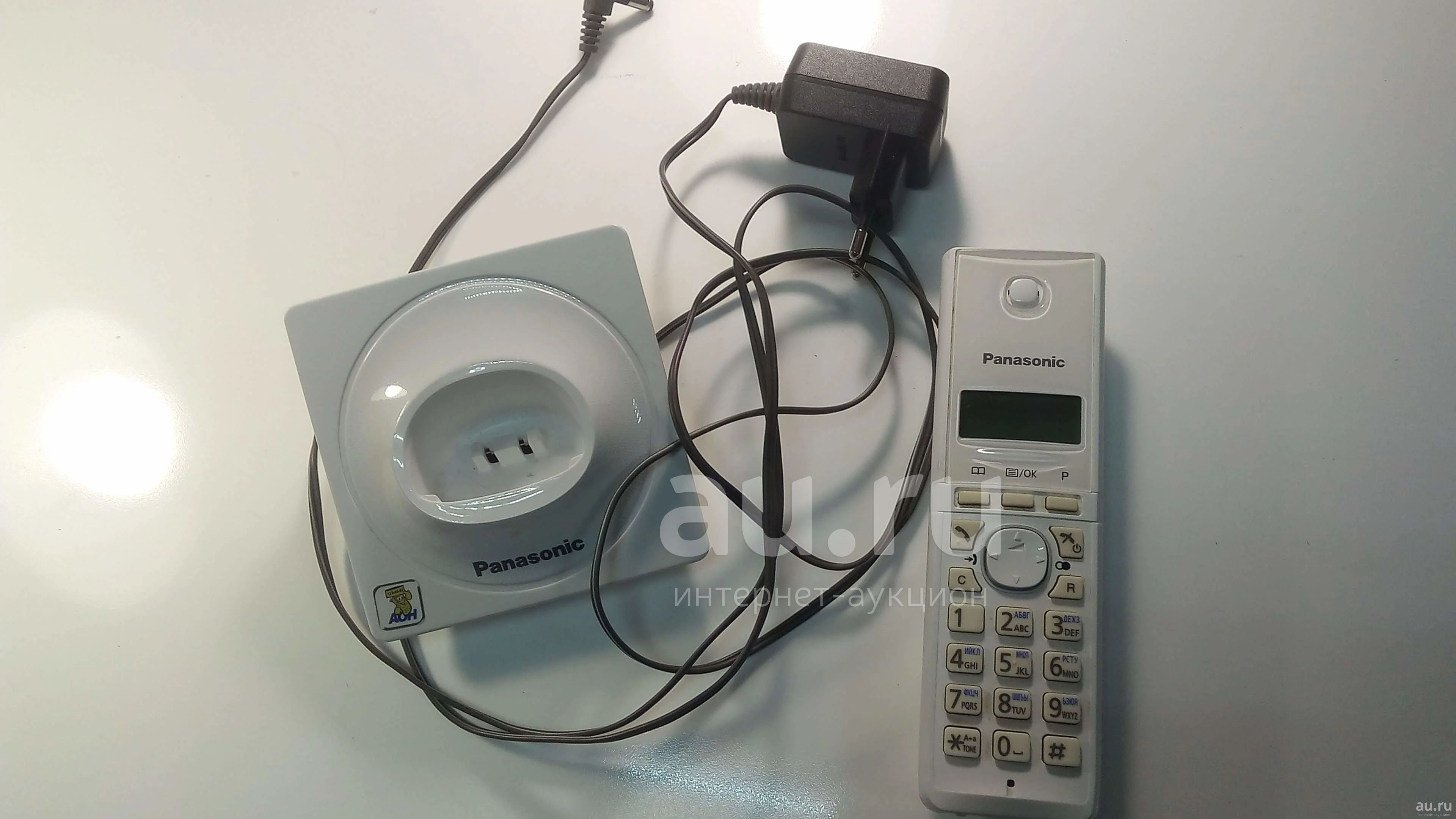 Panasonic Радиотелефон Kx-Tg1711Ru Белый База + трубка + адаптер питания  Б/у арт. 9644 — купить в Красноярске. Состояние: Б/у. DECT и радиотелефоны  на интернет-аукционе Au.ru