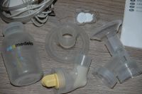 Лот: 5397217. Фото: 3. Молокоотсос Medela Swing + полезный... Дети растут