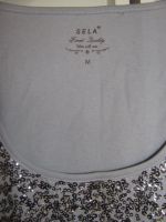 Лот: 7082819. Фото: 2. Майка Sela 44р. с пайетками. Женская одежда