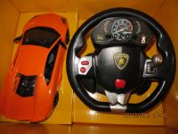 Лот: 4537805. Фото: 2. Lamborghini 1:14 с Рулем (звук... Моделизм