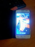 Лот: 8531336. Фото: 4. Телефон LG l65