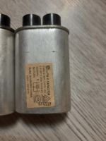 Лот: 25557856. Фото: 2. конденсаторы от микроволновки... Запчасти для бытовой техники