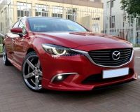 Лот: 15250332. Фото: 6. Клыки переднего бампера на Mazda...