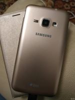 Лот: 15075417. Фото: 3. Samsung Galaxy J1 gold. Красноярск