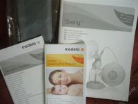 Лот: 2877706. Фото: 3. Молокоотсос MEDELA SWING электронный. Дети растут