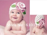 Лот: 5627376. Фото: 4. Новая шапка с цветком для девочки... Красноярск