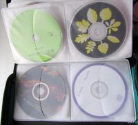 Лот: 13511405. Фото: 2. Музыкальные CD-DVD-диски + сумка-хранилище... Игры, программное обеспечение