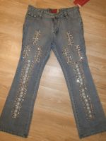Лот: 9073197. Фото: 6. новые джинсы с декоративными элементами...