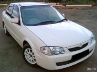 Лот: 13607633. Фото: 8. Mazda Familia, 323 1998-2003 седан...