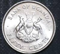 Лот: 11284135. Фото: 2. Экзотика с рубля (12727) Уганда. Монеты