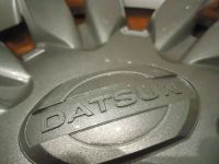 Лот: 11152258. Фото: 2. Колпаки комплект Datsun R14, оригинал... Шины, Диски