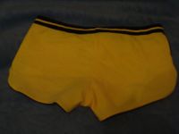 Лот: 8443510. Фото: 2. желтые шортики от купальника. Женская одежда