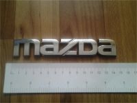Лот: 10573524. Фото: 2. эмблема багажника Mazda. Автозапчасти