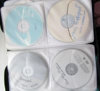 Лот: 13511405. Фото: 4. Музыкальные CD-DVD-диски + сумка-хранилище... Красноярск