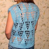 Лот: 12847659. Фото: 3. Вязаный жилет узором треугольники... Одежда, обувь, галантерея