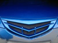 Лот: 18247997. Фото: 2. Решетка радиатора "Значок" Mazda... Автохимия, масла, тюнинг