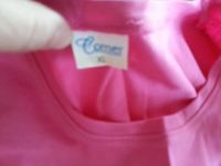 Лот: 9125005. Фото: 2. Футболка с глазками. Женская одежда