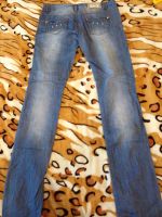 Лот: 6626730. Фото: 2. Стильные рваные джинсы. Женская одежда