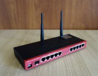 Лот: 21423722. Фото: 2. Wi-Fi роутер MikroTik RB2011UiAS-2HnD-IN. Сетевые устройства