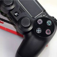 Лот: 4264466. Фото: 2. Sony DualShock 4. Новый, в коробке... Игровые приставки, консоли, видеоигры