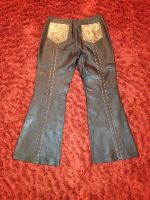 Лот: 3200962. Фото: 2. Кожаные штаны. Женская одежда